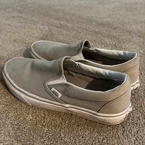 Gray Vans slip on sneakers